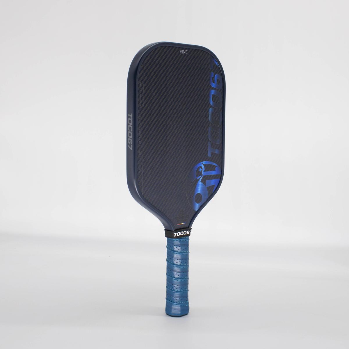 TOCO67 Blue Vine carbon fiber pickleball paddle with matching blue grip handle.