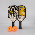 TOCO67 Play Duo Pickleball Set featuring two patterned paddles and two orange pickleballs.