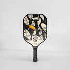 TOCO67 Tucan Play pickleball paddle with black and white toucan pattern.