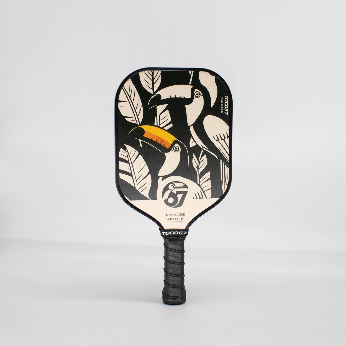 TOCO67 Tucan Play pickleball paddle with black and white toucan pattern.